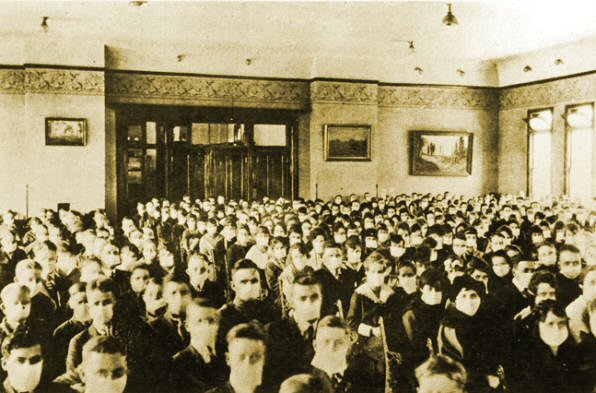 College Hall assembly in 1918 with masks