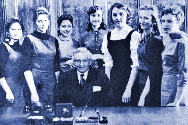 Pres. David O. McKay with women on BYH yearbook 57